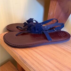 Women's Black Leather Thong Sandals with Fabric Bow Accent